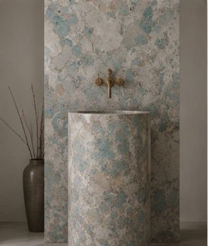 Lavabo scultoreo rivestito con la texture materica