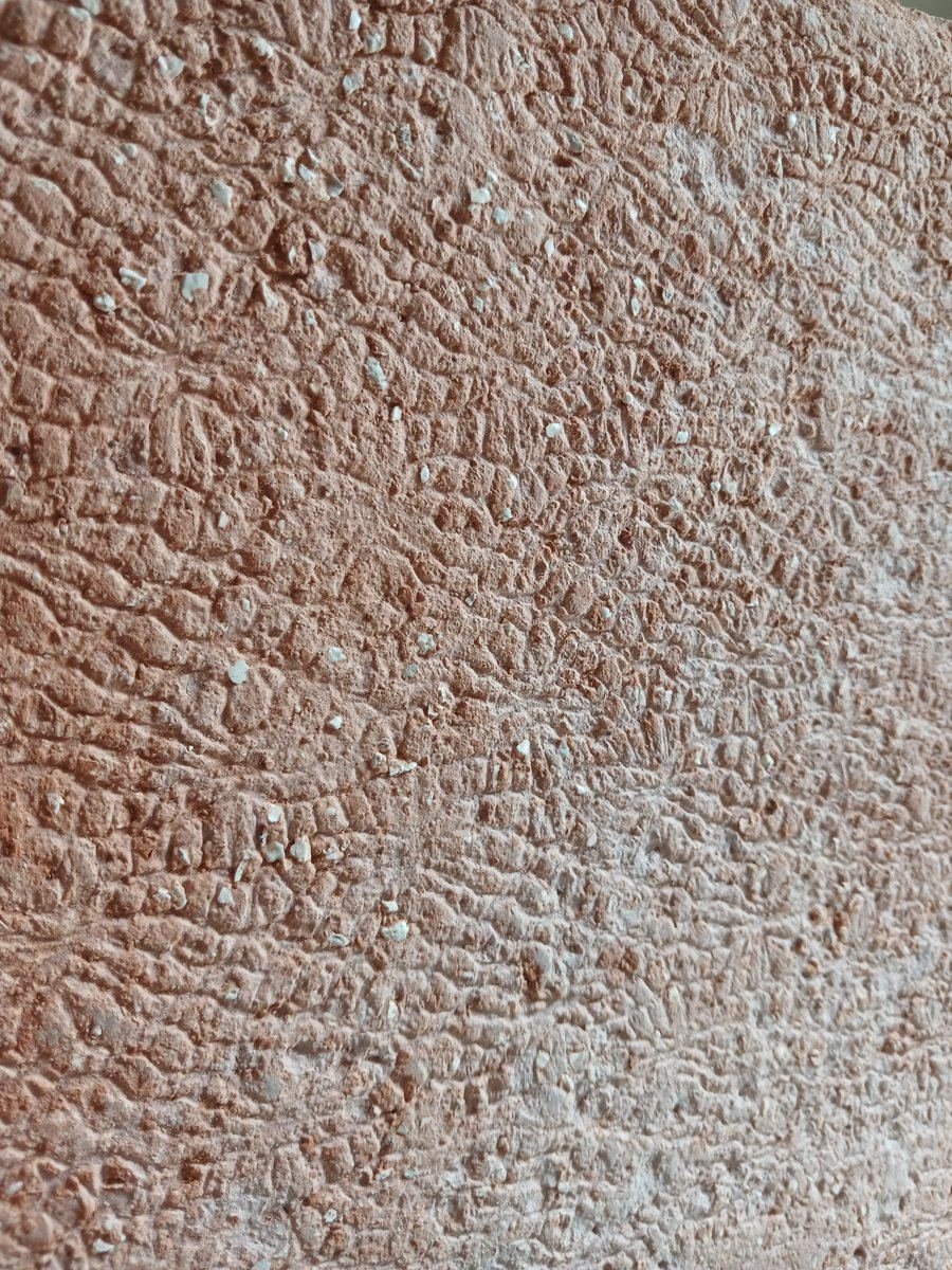 Superficie terracotta a grana materica